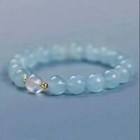 AKVAMARIN 8 mm GYÖNGYBŐL KÉSZÜLT SZÉP KÉK KARKÖTŐ.