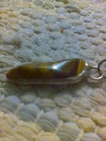 Ezüst felületü UNISEX tigrisszem  medál lánccal