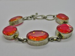 Nagyon szép nagy pink színű csiszolt üvegkövekkel ezüstözött  karkötő