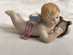 Tündéri nagyon szépen festett porcelán puttó gyűjteménybe való.