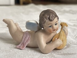 Tündéri nagyon szépen festett porcelán puttó gyűjteménybe való.