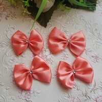 Dark peach colored satin bow ornament, decoration