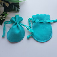 Türkizzöld színű velúr dísztasak, ajándék tasak, ékszertartó zsák