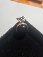 Forgó ónix köves ezüst medál