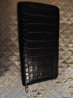 New black wallet purchased in Milan