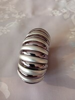 Új,4 cm széles,  divat karkötő  a Bijou Brigitte - ből ezüst - halvány lila színekben