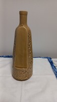 Vintage mustársárga kerámia butella körben domború szőlőinda mintával