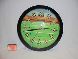 Retro football ball-shaped wall clock