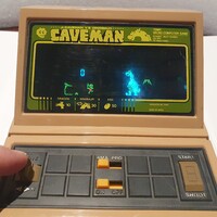 Retro Tomy caveman micro computer game kézi LED játékkonzol kvarcjáték
