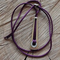 Very special pierre lang zirconia stone gold plated pendant on a cord chain