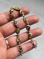 Gyönyörű zöld borostyán köves ezüst karkötő