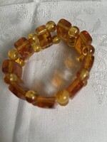 Régi préselt borostyán karkötő szép élénk szinek.