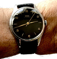 Codaszép1955-ös ritka emelthidas fekete DOXA jumbó 38, 1 mm k.n. Órás szervíz garancia Pontos! Új bő