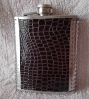 Old leather coated pocket flask.