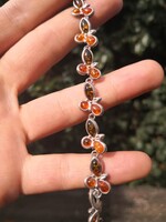 Gyönyörű borostyán köves ezüst karkötő