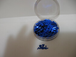 Trombitáló angyal forma kék flitter dekoráció egy dobozzal.