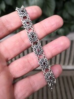 Szépséges, gránát köves ezüst karkötő