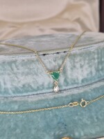 Arany nyakék smaragddal és brillel