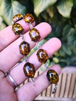 Gyönyörű borostyán köves ezüst karkötő