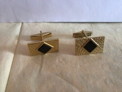 Elegáns vintage mandzsetta gomb  arany színű alapon fekete berakással