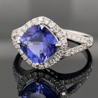 Tanzanit 0.50ctBrillekkel gyönyörű arany gyűrű.ÚJ.Igazolással