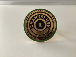 Hűtőrácsdísz jelvény Aranykerék I.