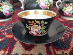 Antique black floral patterned gilded coffee and tea set for two