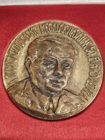 A TANÁCSKÖZTÁRSASÁG 50. ÉVF. KUN BÉLA BRONZ ÉREM