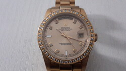 Rolex automatic gold case, buckle, stones on the bezel, replica, not original