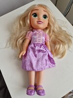 Disney Aranyhaj 34cm magas baba, lila ruhában és cipőben