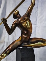 Borisz Alekszandrovics Szvinyin: Villámot tartó női alak "Art Deco" bronz szobor gránit talapzaton.
