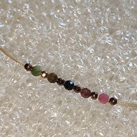 9k arany végzáras turmalin órakísérő karkötő