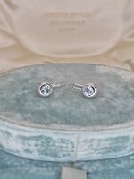 Fehérarany fülbevaló pár kék topázzal