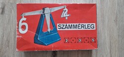 Számmérleg retro oktató játék dobozában.
