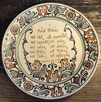 Korondi kézműves kerámia falitányér, népi virágmintás Házi áldás felirattal, 24 cm-es méretben