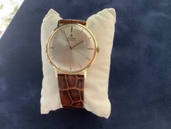 Doxa 14k-os aranyóra. Mechanikus szerkezetű, megbízható.