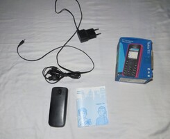 Nokia 113 telefon dobozával tartozékaival