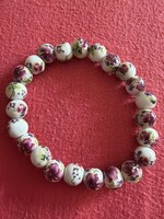 Nagyon szép bordos lila virágos porcelán karkötő