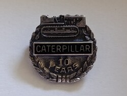 Ezüst Caterpillar 10 éves alkalmazotti szolgálati kitűző