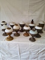 Antique kerosene lamp with cast iron base and milk glass tank