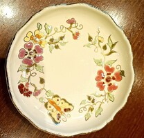 Zsolnay Jubileum 150 – aranyozott, virágos-pillangós porcelán dísztálka, 12 cm