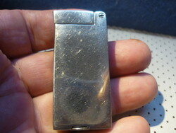 Gasoline Lighter as shown in the photos! Working condition!
