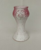 Ceramic candle holder with floral decoration