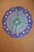 Old, round, thin tissue napkin