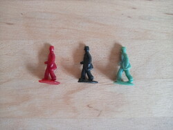 Three moving postman figures for the old board game 'The Little Postman'
