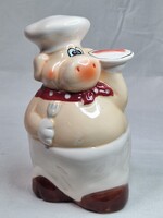 Humorous porcelain pig in the shape of a chef with cutlery in good condition for sale, 15 cm tall.