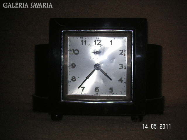 Table clock with foreign label for sale..