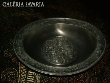 A marked pewter serving bowl with a relief pattern is rare!