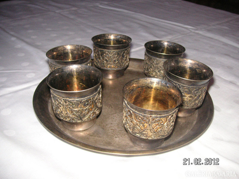 Russian vodka set with silver-plated tray and gilded vodka glasses inside