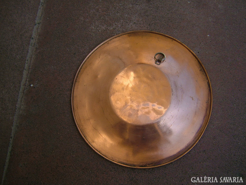 Richly decorated copper wall plate